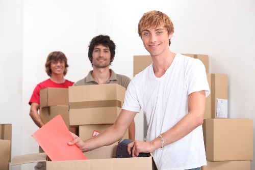 Professional movers organizing items for a Hackneywick relocation