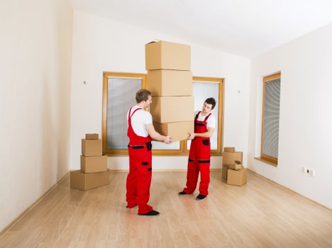 Packed boxes and furniture ready for small removals in Hackneywick